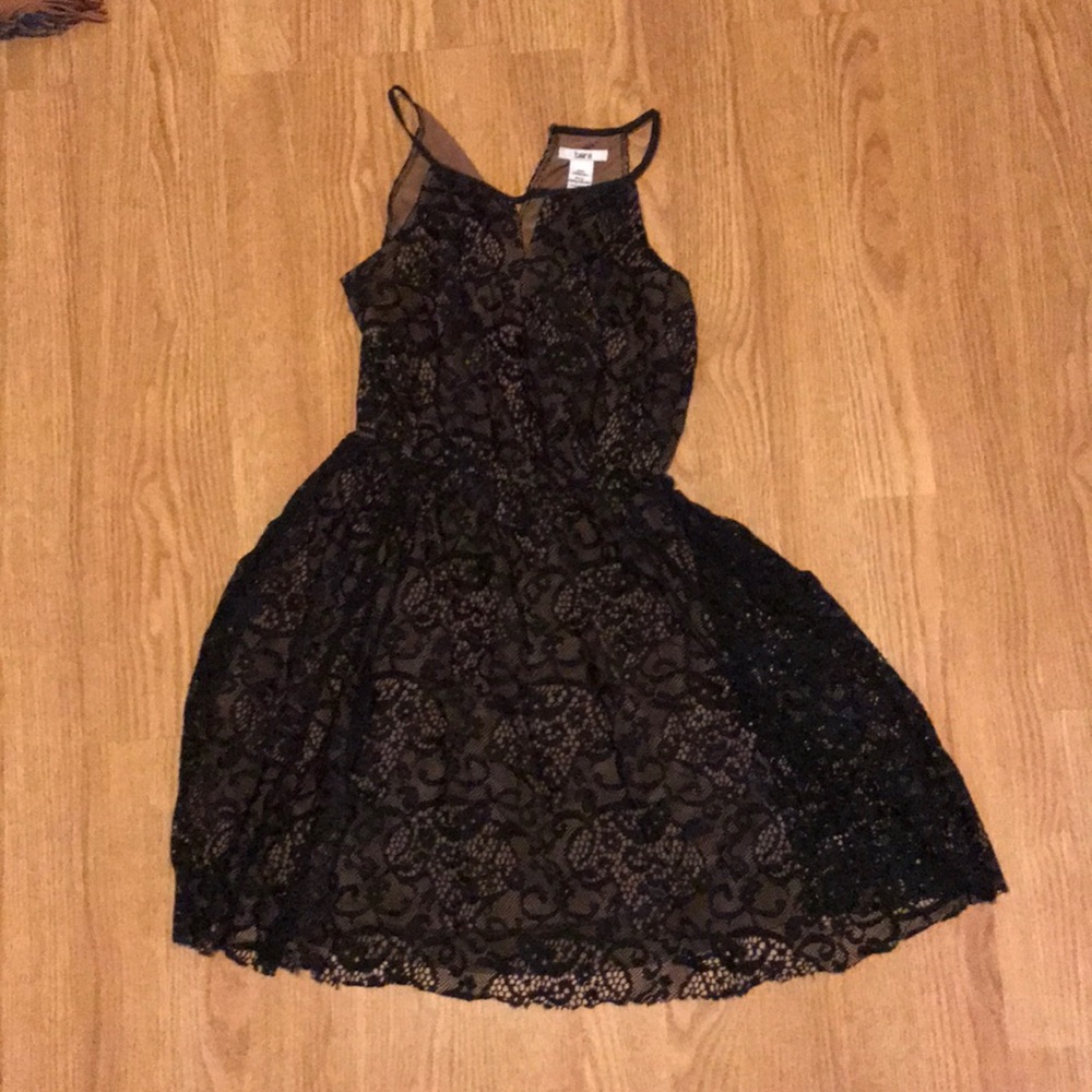 Black dress with lace pattern.